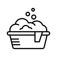 Plastic basin with soap suds. Washing clothes, cleaning equipment.