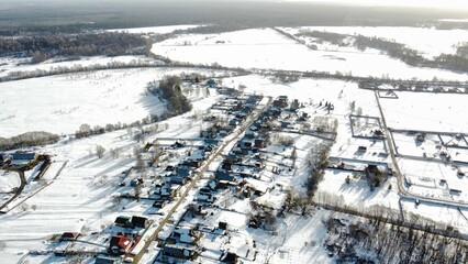 view from the height of the village with streets in winter. High quality photo