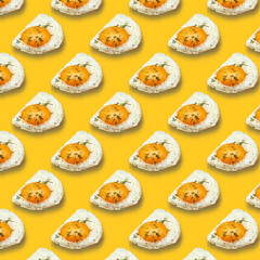 Chicken fried egg sprinkled with herbs isolated on yellow background. Scrambled eggs close-up seamless pattern.