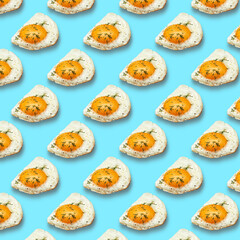 Chicken fried egg sprinkled with herbs isolated on blue background. Scrambled eggs close-up seamless pattern.