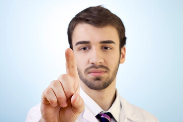 Young Doctor is Touching To A Virtual Screen