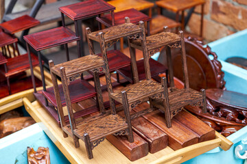 Close-up of mahogany shelves for sale in the market