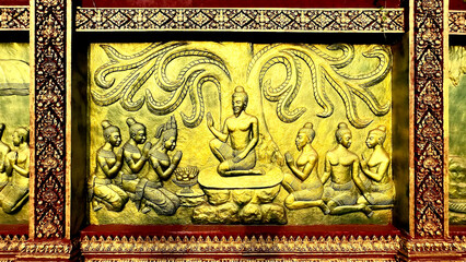 18 April 2022, Goldend wall with Khmer Empire concept at  Wat Taing Kork, Kampong Thom Province, 50's architecture. Located Tang Kork District, Kampong Thom Province, Cambodia.