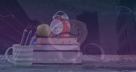 Image of data processing over clock and books