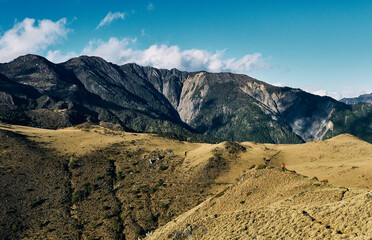 A man hiking in the mountains.