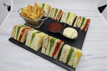 Club Sandwiches with french fries