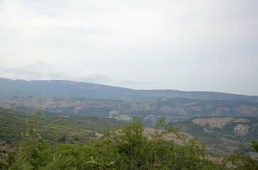 Naklejka premium a village between mountains and hills, a journey through the mountainous regions of the Caucasus. Nature of Dagestan