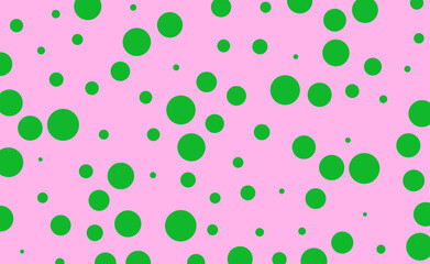 Fondo rosa con manchas verdes.
