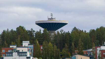 Finland cityscape, water tower in the woods