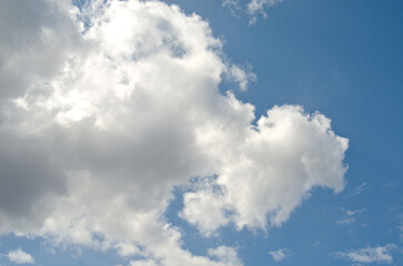 blue sky with rain clouds