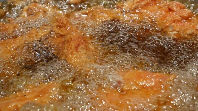  Fried chicken in deep fry outdoor 
