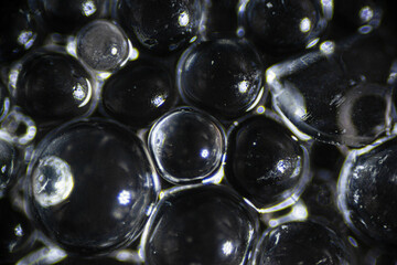 Silica gel for moisture control, absorbent particles under a light microscope, magnification 40 times