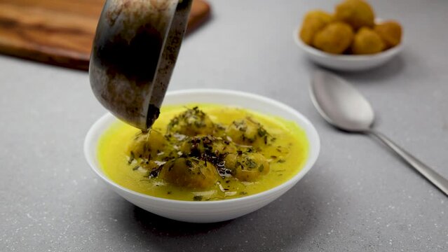 kadhi pakora is ready to serve, tempering with ground spices roasted in desi ghee