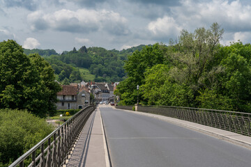 bridge leading across the Dordogne River into the historic village of Beaulieu-sur-Dordogne