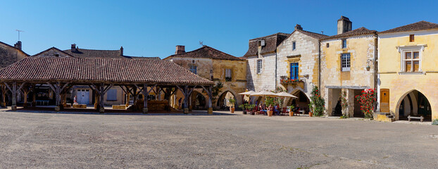 panorama view of the Place des Cornieres Square in the historic city center of Monpazier