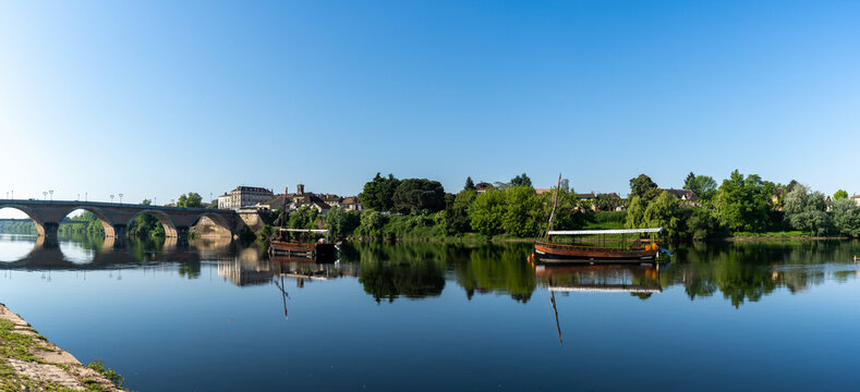 the Dordogne River near Bergerac with typical wooden Gabare river barges