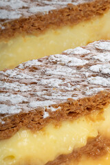 Close up shot of two mille feuilles or vanilla slices
