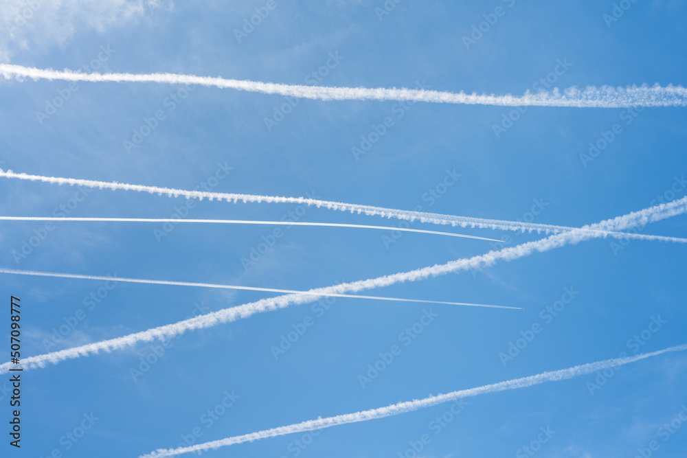 Wall mural blue sky with lines of airplanes.