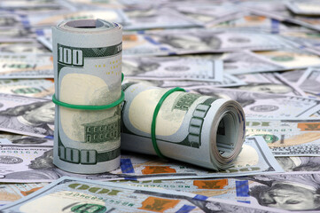 Hundred dollar bills rolled