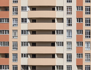 Residential houses or chalet with white walls and wooden balconies