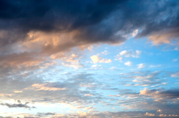 Naklejka na ściany i meble Blue sky with clouds at sunset