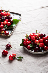 Fresh sweet cherry with green leaves