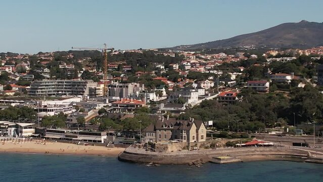 Drone aerial view of main beaches in Cascais, Portugal including Duquesa and Conceicao
