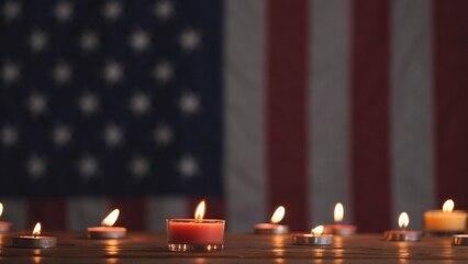 Happy Memorial Day, Man hand lighting memorial candle on American USA flag dark background. Concept...