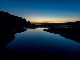 Fototapeta na wymiar Blue Hour Sunset over Home Bay Point Reyes CA