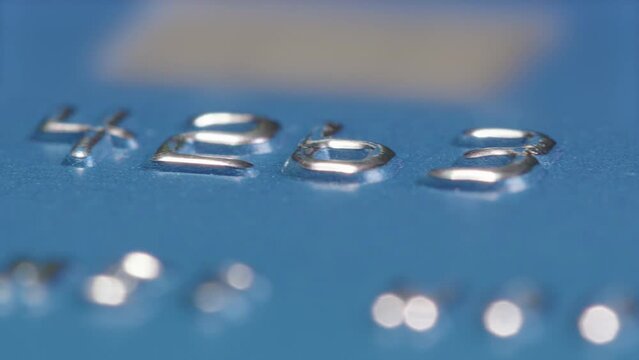 HUGE MACRO SLIDER shot of a credit cards numbers