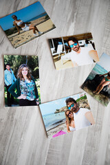several photos of a couple in love on their summer vacations, by the beaches of Mallorca. with a gray wooden background.