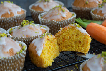 carrot muffins on a cake rack, freshly baked