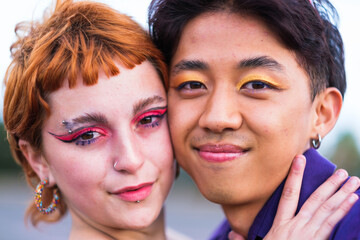 Portrait of teenagers with makeup fighting for pride
