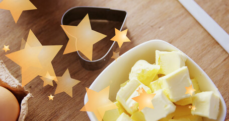 Image of falling yellow stars over ingredients
