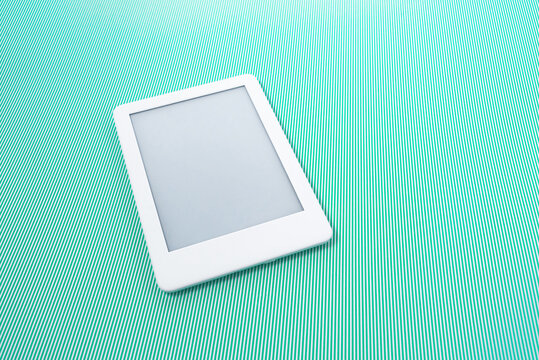 Ebook reader over green striped background