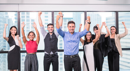 business people stand with confidence in modern office look to camera,team business raise hand