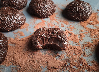 closed up in brazilian brigadeiro on a rustic background