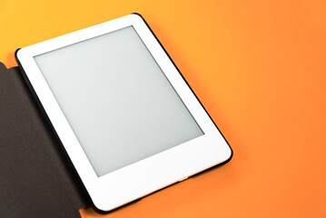 Ebook reader over yellow background