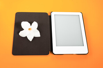 Ebook reader over yellow background