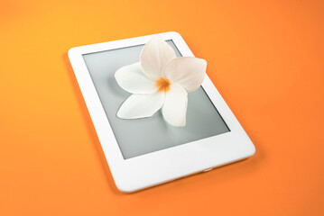 Ebook reader over yellow background