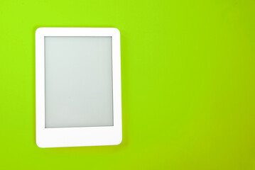 Ebook reader over yellow background