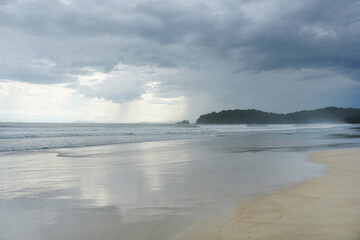 Sea landscape with rainy nimbostratus clouds.  Rainy weather with heavy clouds. 