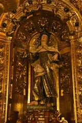 Neapolitan type sculpture of Saint Teresa of Avila, depicting the saint with her characteristic...