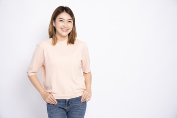 Portrait of Young beautiful Asian woman smiling isolated on white background, Looking at camera