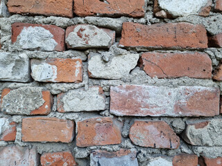 A fragment of an old brick wall in the city center of Lodz.