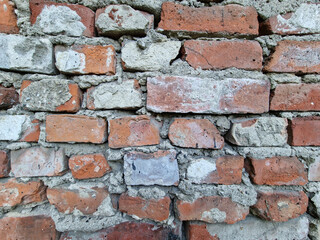 A fragment of an old brick wall in the city center of Lodz.