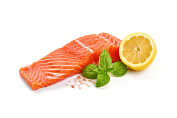 Fresh salmon fillet with basil and lemon, isolated on white background.