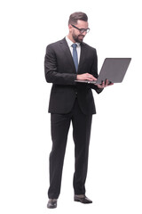 in full growth. businessman with open laptop.