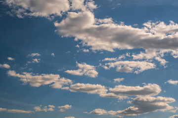 blue sky panorama may use for sky replacement. blue sky background with white striped clouds in heaven and infinity.