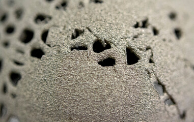 Models printed on 3D printer for metal macro. Object surface close-up. Layout created on metal 3D printer. New modern progressive additive 3D printing technology. Prototyping, Industrial production